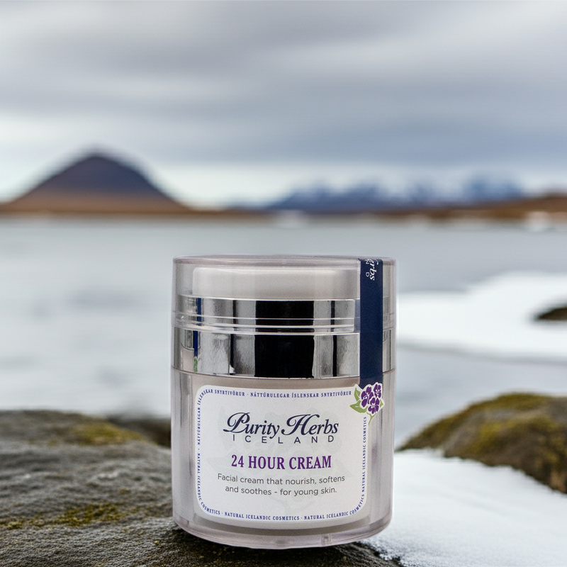 Jar of Purity Herbs Iceland 24 Hour Cream on a snowy landscape with mountains in the background